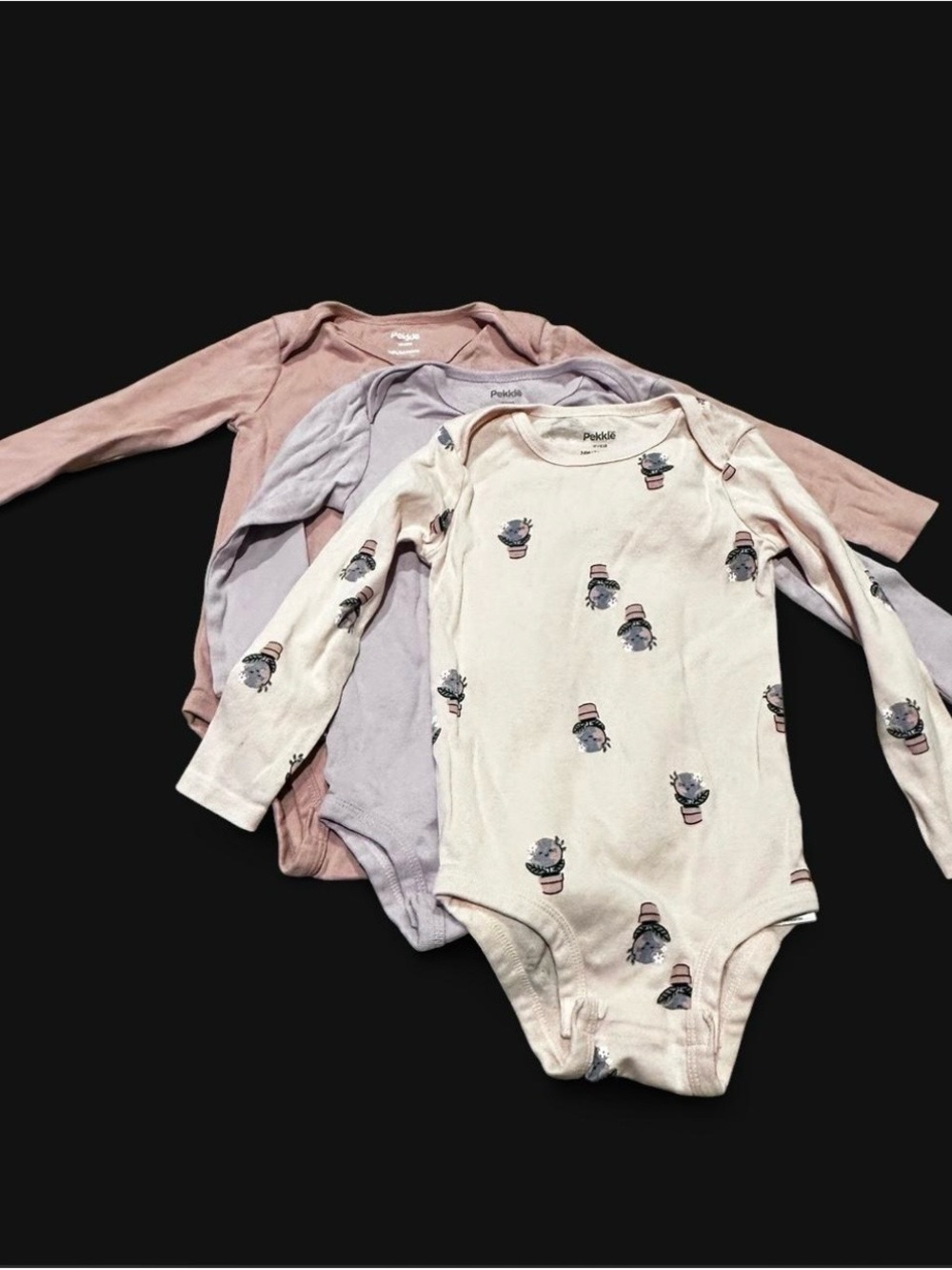 Pekkibaby Long-Sleeve Bodysuit 4-Pack in Cream, Lavender, and Dusty Pink
